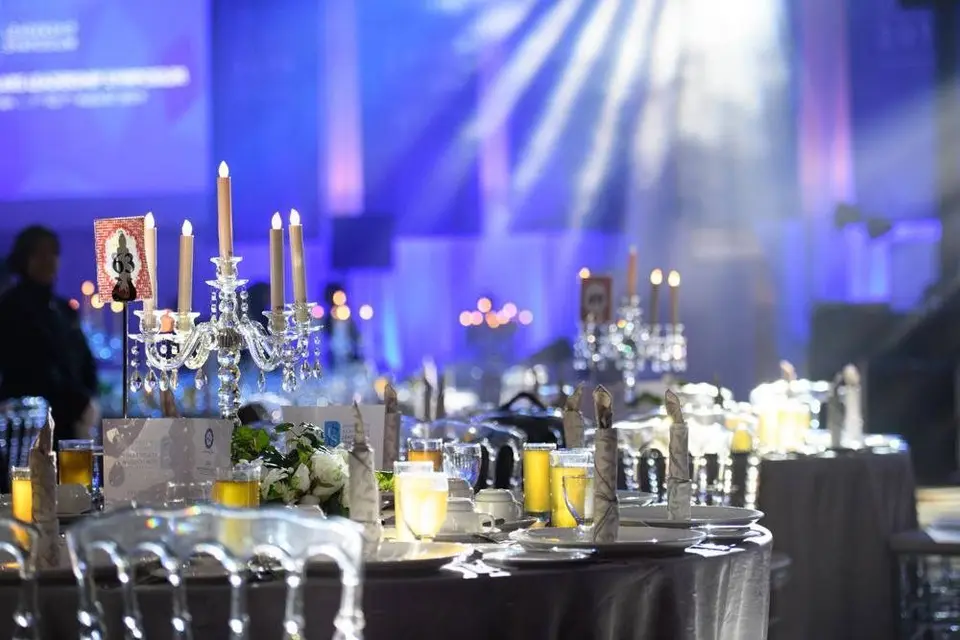 Stage lighting and candlelit event production by YL Events