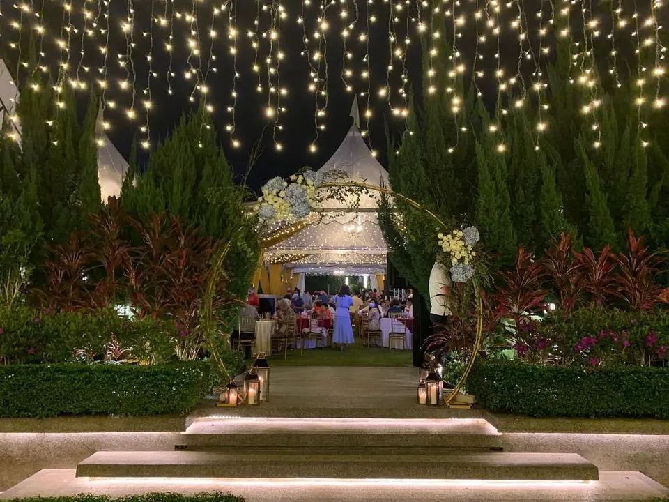 YL Events garden entrance styling at night